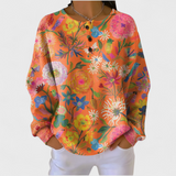 Faustine - Orange Jumper with Colourful Floral Pattern