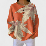 Manon - Orange Jumper with Autumn Leaf Design